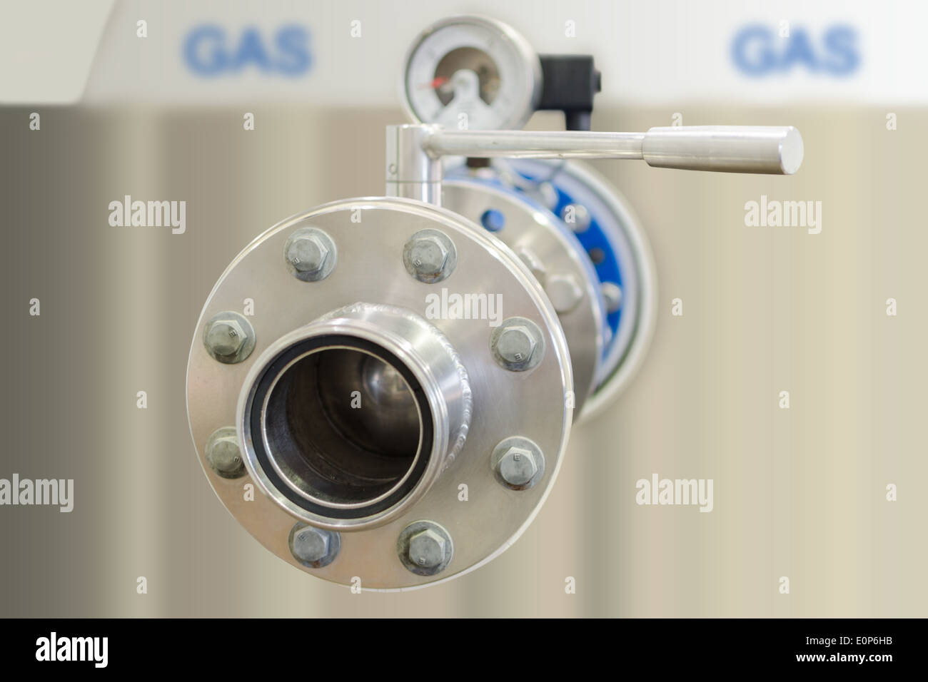Gas tank with stainless steel flange pipe and closed valve Stock Photo