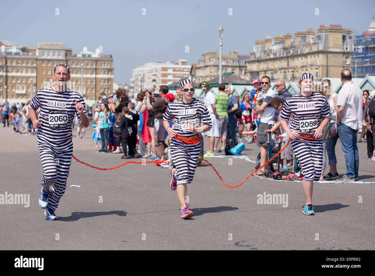 Hove Promenade, Hove, City of Brighton & Hove, East Sussex,UK. Brighton's Heroes Run Pass It On Africa 2014 charity fund raiser along Hove Promenade, a 5km course dressed as their favourite super heroes or villains. David Smith/Alamy Live News Stock Photo