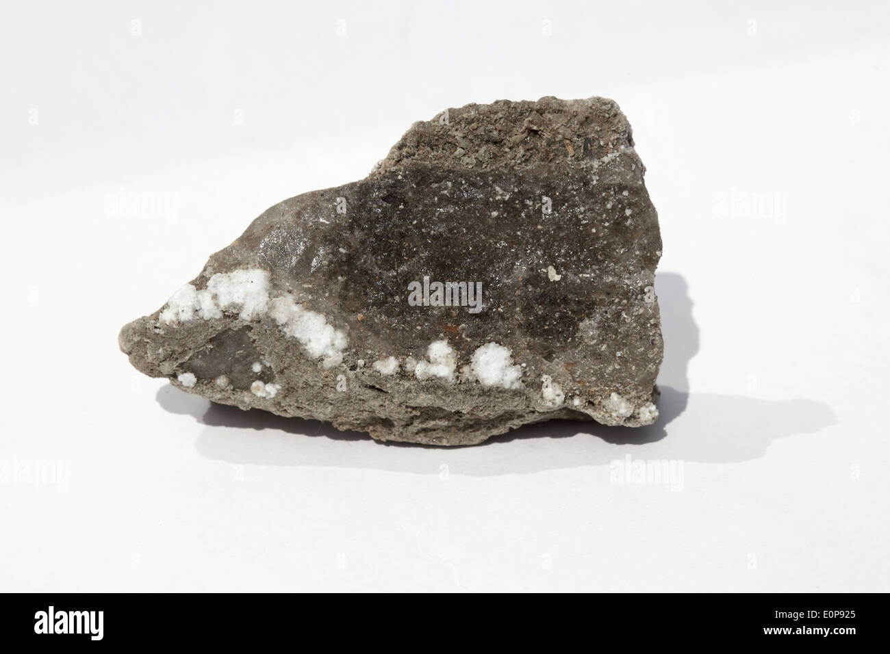Rock ingrained with salt crystals. Stock Photo