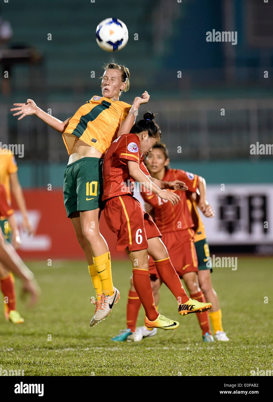 Ho Chi Minh, Vietnam. 18th May, 2014. Emilyvan Egmond (Top) of Australia vies for the ball during the Group A match against Vietnam at the 2014 Women's AFC Cup held at Thong Nhat Stadium in Ho Chi Minh city, Vietnam, May 18, 2014. Australia beat Vietnam 2-0. © He Jingjia/Xinhua/Alamy Live News Stock Photo