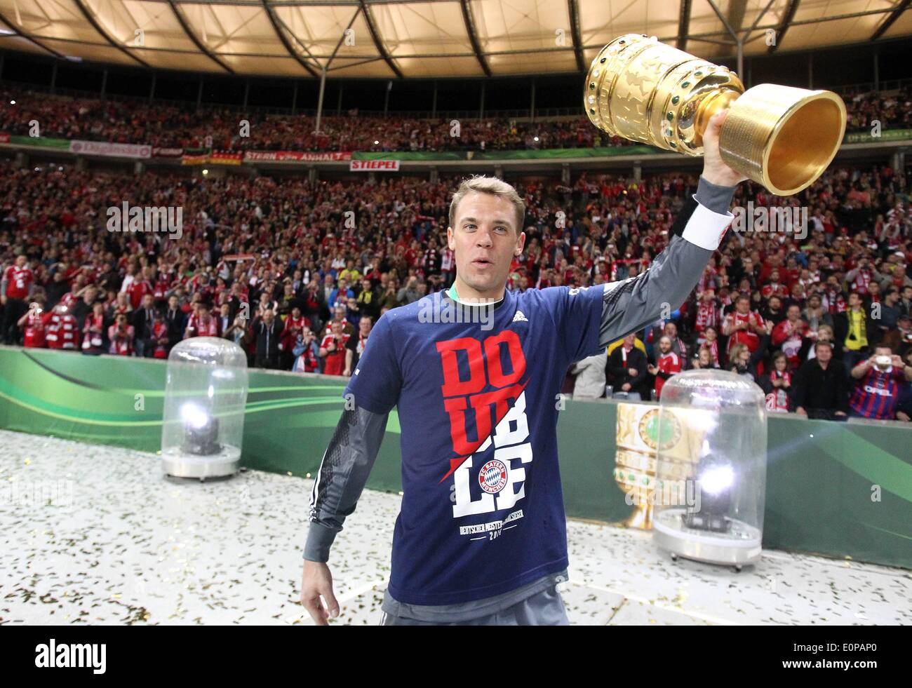 Berlin, Germany. 17th May, 2014. German DFB Cup final. Borussia Dortmund versus Bayern Munich. Manuel Neuer ( Bayern) celebrates with the trophy Credit:  Action Plus Sports/Alamy Live News Stock Photo