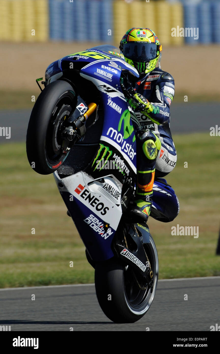 Le Mans, France. 18th May, 2014. MotoGP Racing. Valentino Rossi (Movistar  Yamaha Team) with a wheelie during the race at Bugatti circuit Credit:  Action Plus Sports/Alamy Live News Stock Photo - Alamy