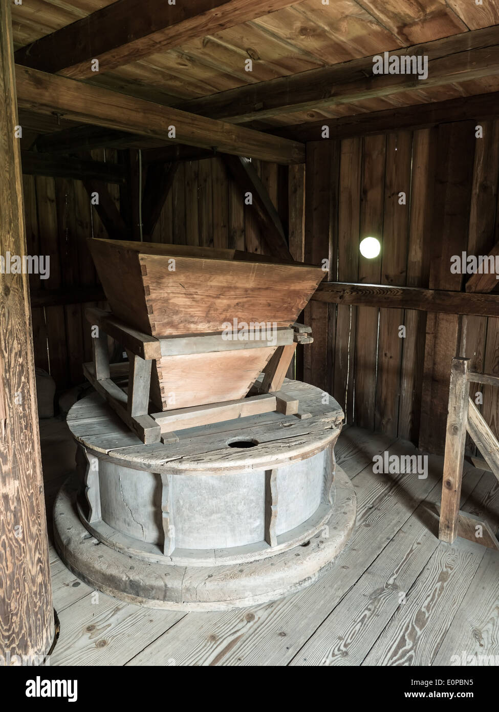Old wooden corn windmill gear and corn cleaner Stock Photo