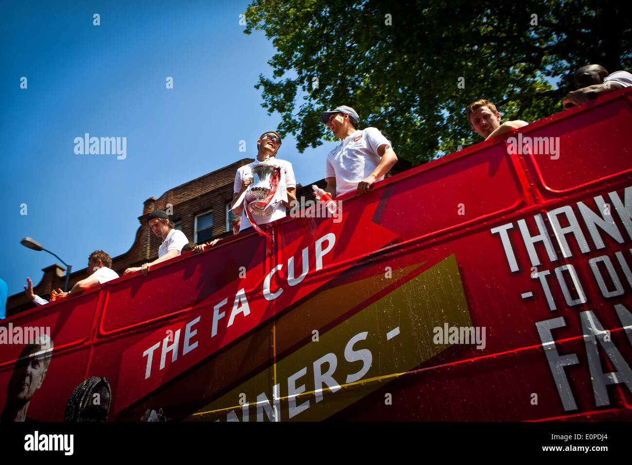 Fans attending the Arsenal FC FA Cup winners parade 2014 Stock Photo