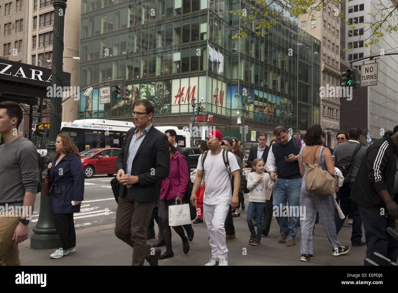 42nd St. near 5th Ave is always crowded with tourists, New Yorkers & office workers. NYC. Stock Photo