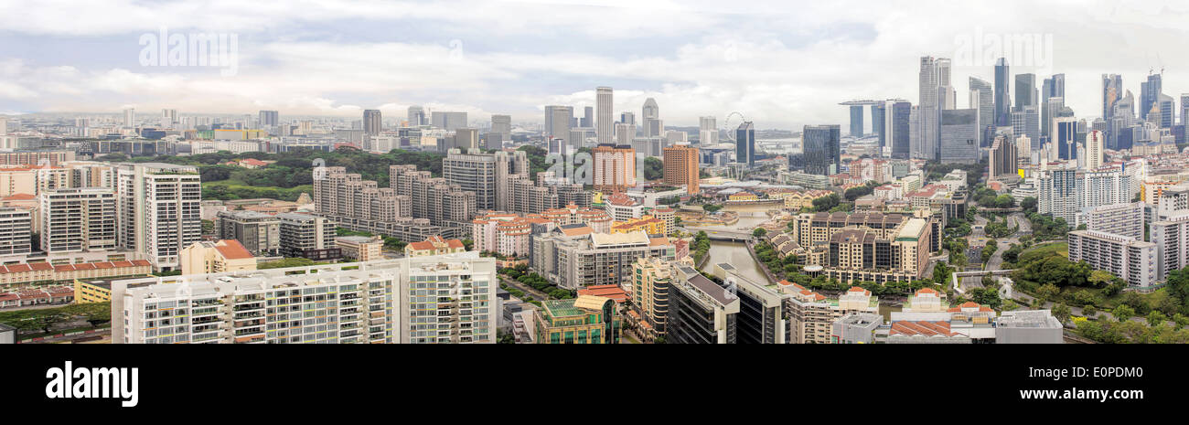 Condominiums Along Singapore River with Central Business District Skyline Panorama Stock Photo