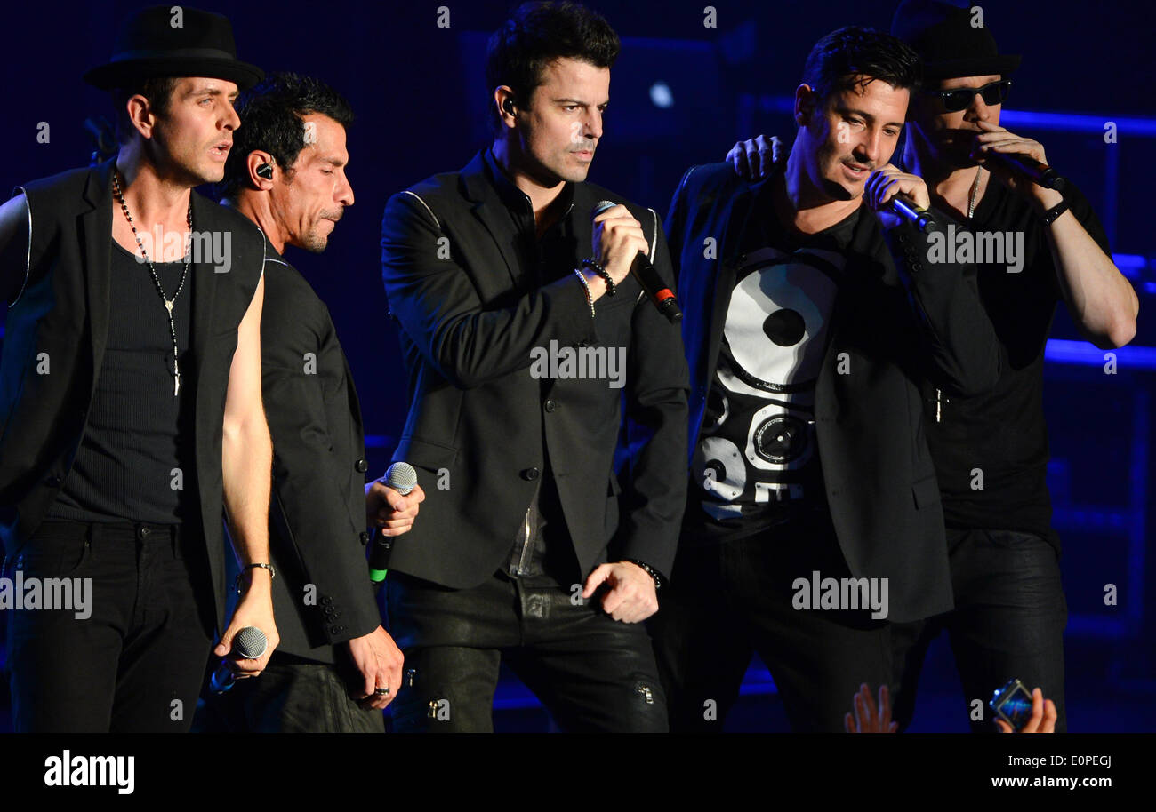 Frankfurt, Germany. 17th May, 2014. The members of the US-band New Kids On The Block Joey McIntyre (L-R), Danny Wood, Jordan Knight, Jonathan Knight and Donnie Wahlberg perform on stage during their first concert on their Germany tour in Frankfurt, Germany, 17 May 2014. The former boy-band was popular amongst teenagers in the early 1990s. Photo: Arne Dedert/dpa/Alamy Live News Stock Photo