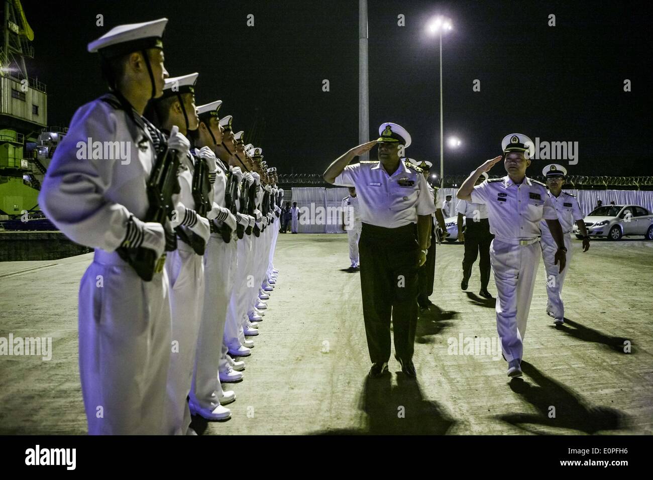 Visakhapatnam. 18th May, 2014. Flag Officer Commanding-in-Chief of Indian Eastern Naval Command Anil Chopra (2nd R front) reviews an honor guard with Command of China's missile frigate Weifang Han Xiaohu (1st R front) during a reception for Chinese Navy training vessel Zhenghe and missile frigate Weifang at port of Visakhapatnam in east Indian on May 18, 2014. Chinese Navy training vessel Zhenghe and missile frigate Weifang arrived in port of Visakhapatnam in east Indian and started a 4-day visit on Saturday, May 17. Credit:  Zheng Huansong/Xinhua/Alamy Live News Stock Photo