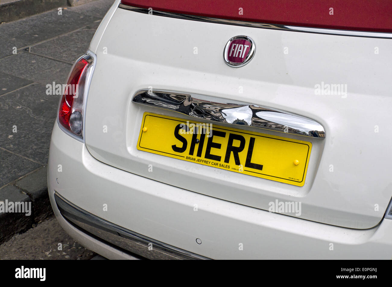 Personalised car license plate with a spelling of the female name Sherl,  pronounced Sheryl. Stock Photo