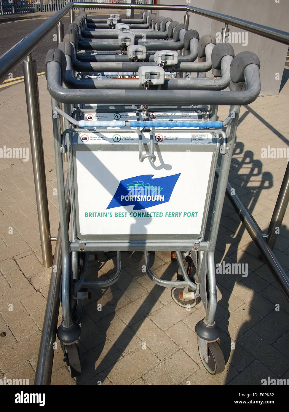 Luggage trolleys at Portsmouth international ferry port Stock Photo