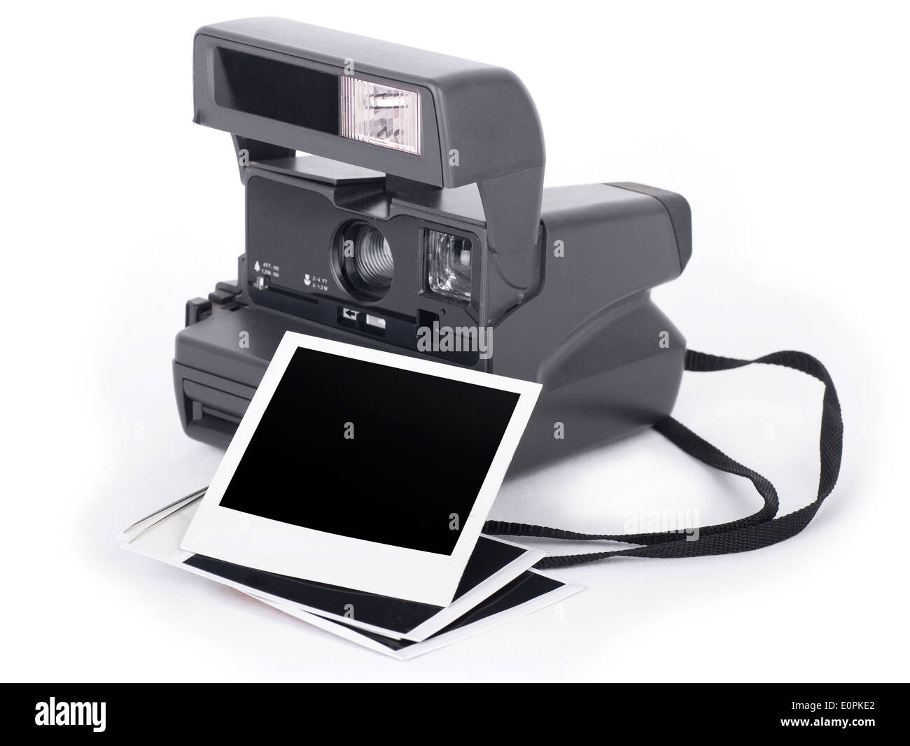 Retro polaroid instant camera with blank photos Stock Photo Alamy