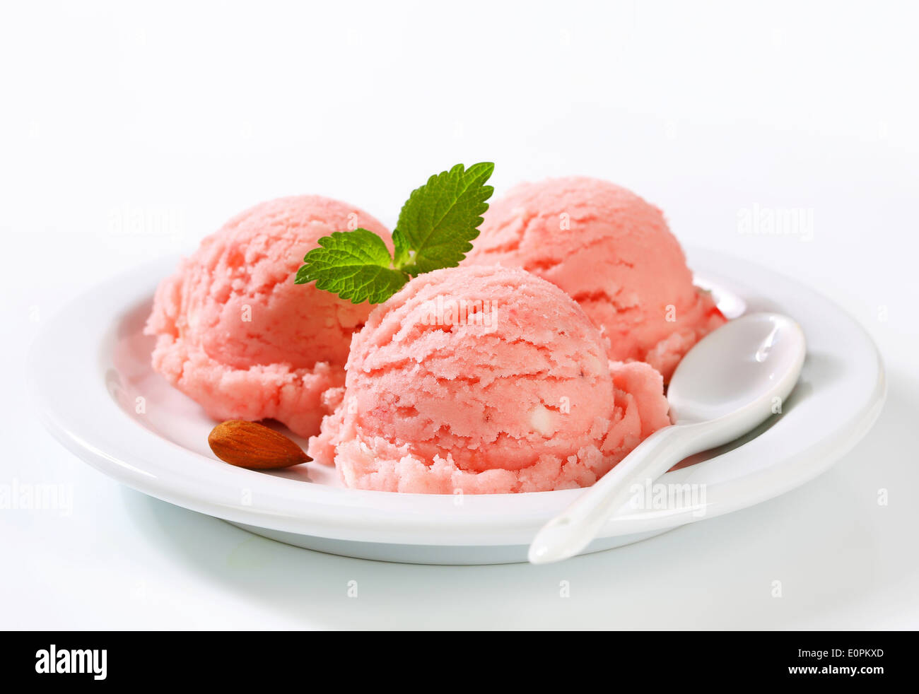 Three scoops of strawberry sorbet Stock Photo