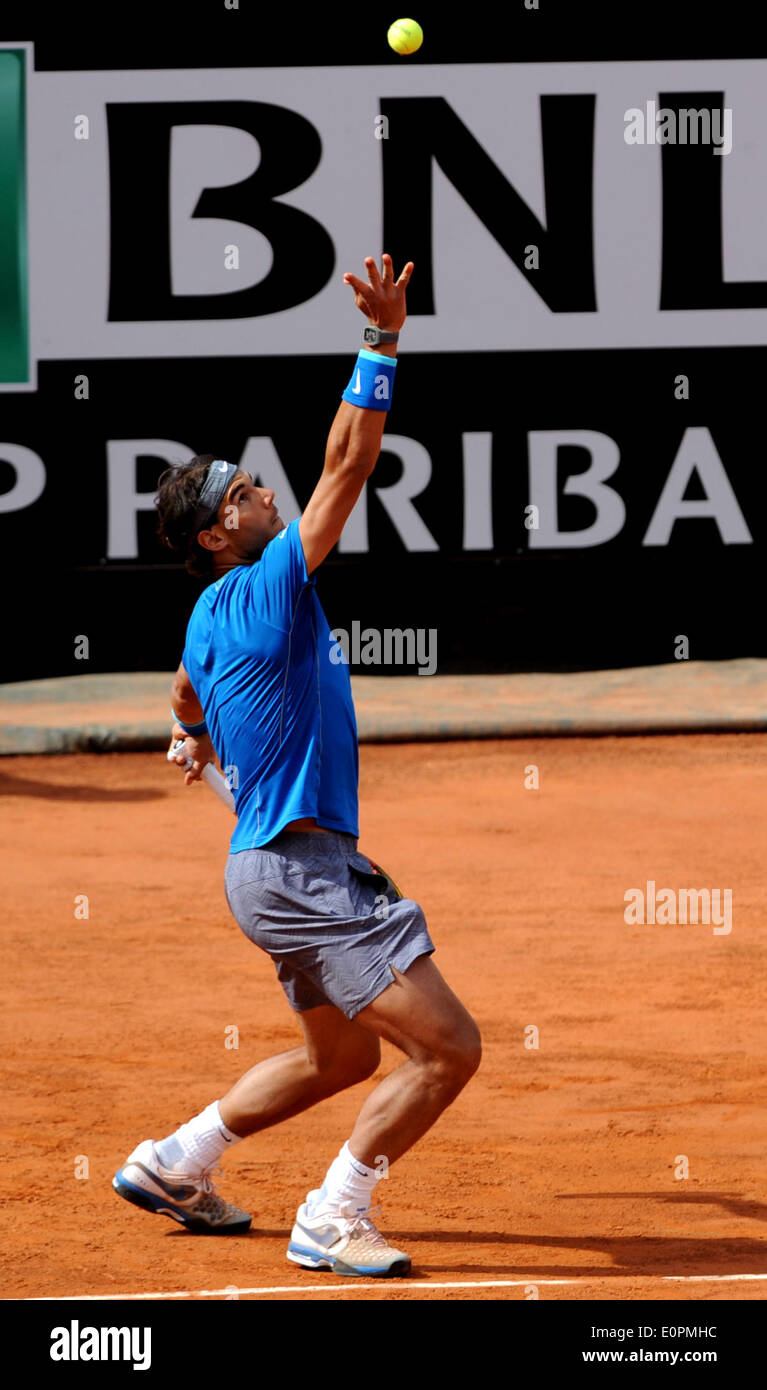 Rome, Italy. 18th May, 2014. Rafael Nadal of Spain serves to Novak Djokovic  of Serbia during their men's singles final match at the Rome Masters tennis  tournament in Rome, Italy, May 18,