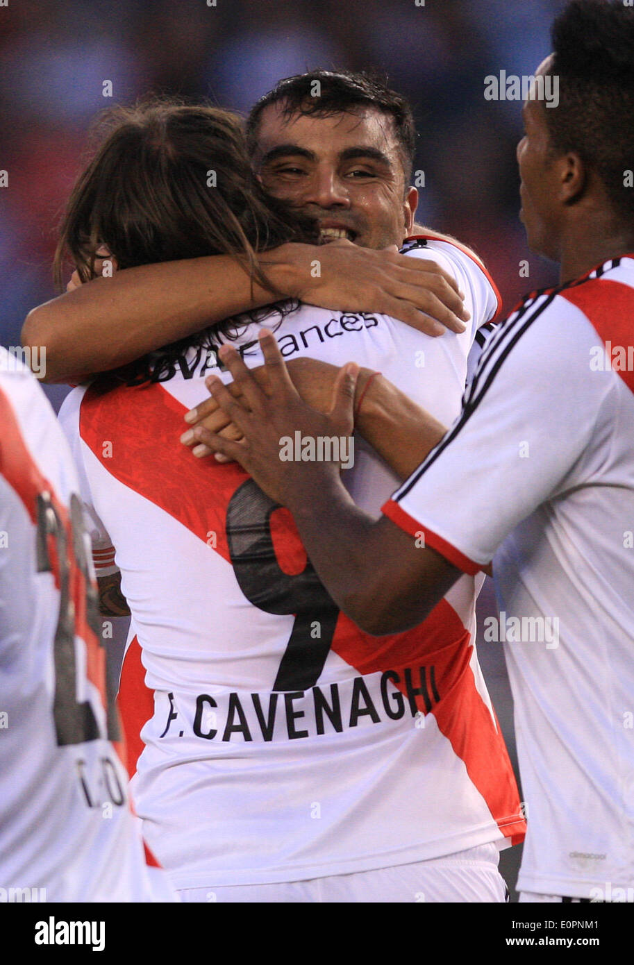 (140519) -- BUENOS AIRES, May 19, 2014 (Xinhua) -- Gabriel Mercado (Rear) of River Plate celebrates a scoring with his teammate Fernando Cavenaghi after the Argentine First Division football match against Quilmes in Buenos Aires, capital of Argentina, on May 18, 2014. River Plate defeated Quilmes by 5-0 and won the tournament. (Xinhua/Martin Zabala) (jp) (ah) Stock Photo