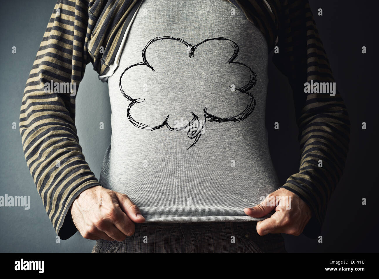 Casual man with thinking balloon cloud with copy space for your text or graphics Stock Photo