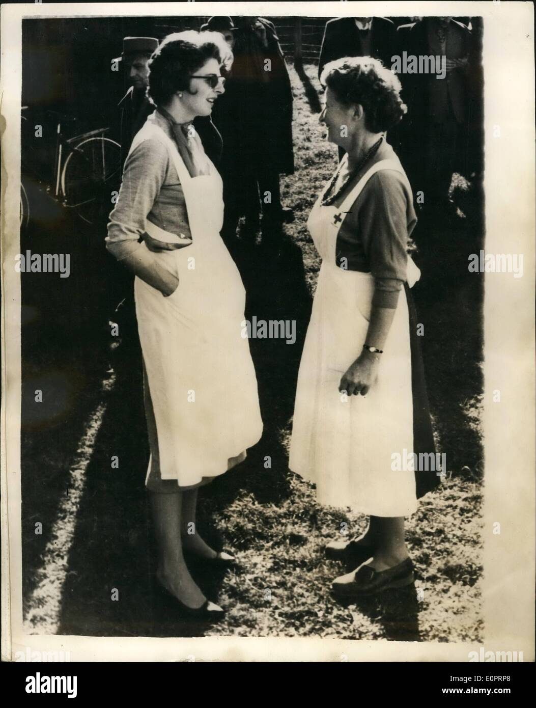 Nov. 11, 1956 - Hungarian Refugees Arrive In Switzerland: Some 200 Hungarian refugees, mainly whole families with children, arrived at the Swiss frontier on Thursday, where they are the guests of the Swiss Red Cross. Photo shows Princess Gina of Liechtenstein (left), was ready to help when the refugees arrived at the frontier. Stock Photo