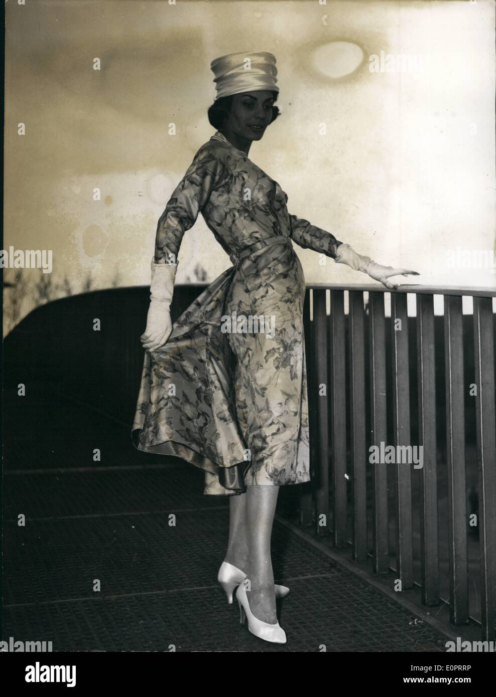 Nov. 11, 1956 - The new spring fashion. Show Heinz Oestergaard today at Dusseldorf. ''Livia'' a yellow afternoon dress from silk. Stock Photo