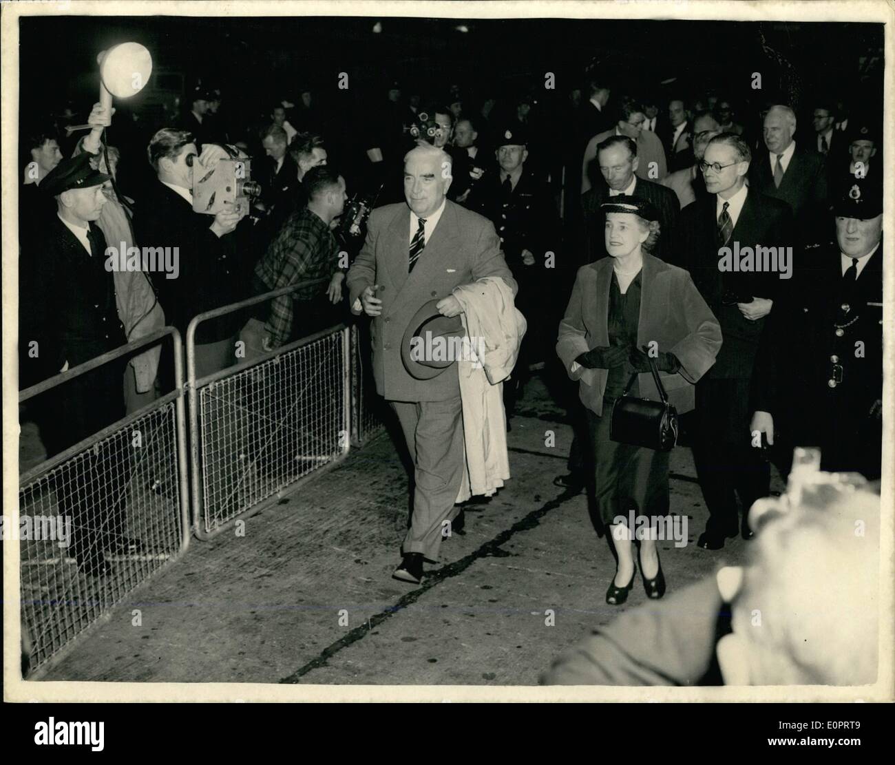 Nov. 11, 1956 - 11-9-56 Mr. Menzies arrrives at London airport. Walking from the aircraft. Mr. Menzies arrived at London Airport this evening at the end of his talks with Colonel Nasser in Cairo on the Suez situation. Keystone Photo Shows: Mr. Menzies and his wife make their way from the aircraft on arrival at London Airport this evening. Stock Photo