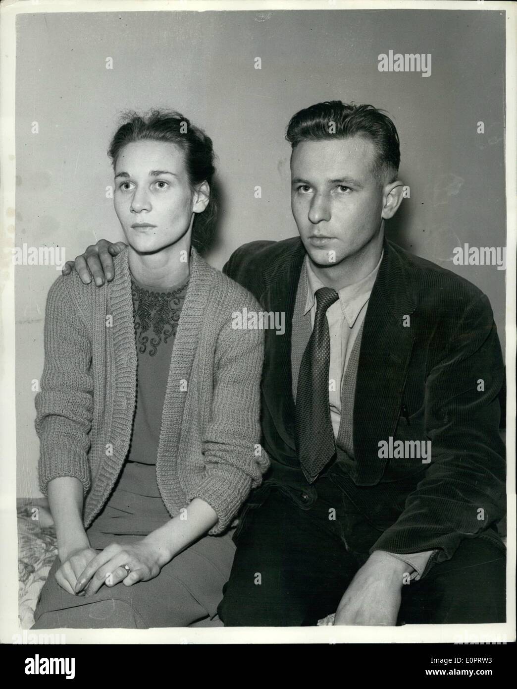 Nov. 11, 1956 - Police and Local People search for missing boy: Police and Local search parties are scouring the area of Romford, Essex - for traces of three year old Boyd Fearon.. The boy was last seen on Thursday - and it is thought he may have been kidnapped. Photo Shows Mr. and Mrs. Leonard Fearon - parents of the boy... They wait anxiously for news of their missing son. Stock Photo