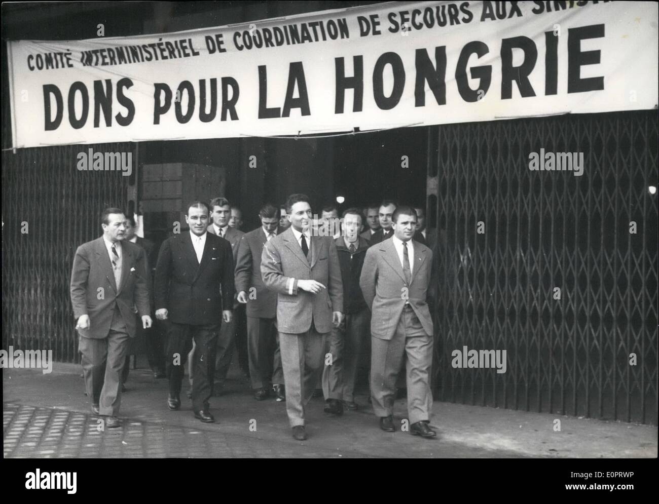 Nov. 11, 1956 - Hungarian Footballers visit Paris centre for Parcels for Hungary: Puskas and some of his team-mates of honved who will play versus racing in Paris tomorrow visited the Gare D'Orsay where food and meddecing Parcels are being sorted out for Shipment to Hungary. Photo Shows Puskas (extreme right) and his comrades leaving the Gare 'Orsay after their visit this morning. Stock Photo