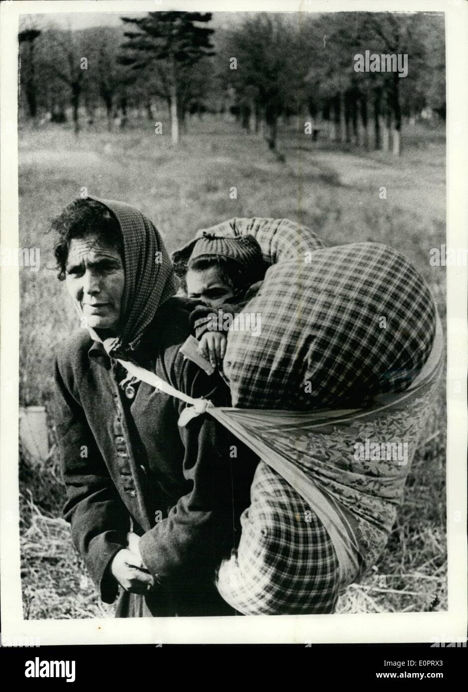 Nov. 11, 1956 - Hungarian refugees arrive in Austria. Photo shows with grief and tiredness marked on her face this Hungarian woman who rescued her child by carrying it on her back on the flight from Hungary into Austria is pictured on arrival at the Traiskirchen Camp in Austria. Stock Photo