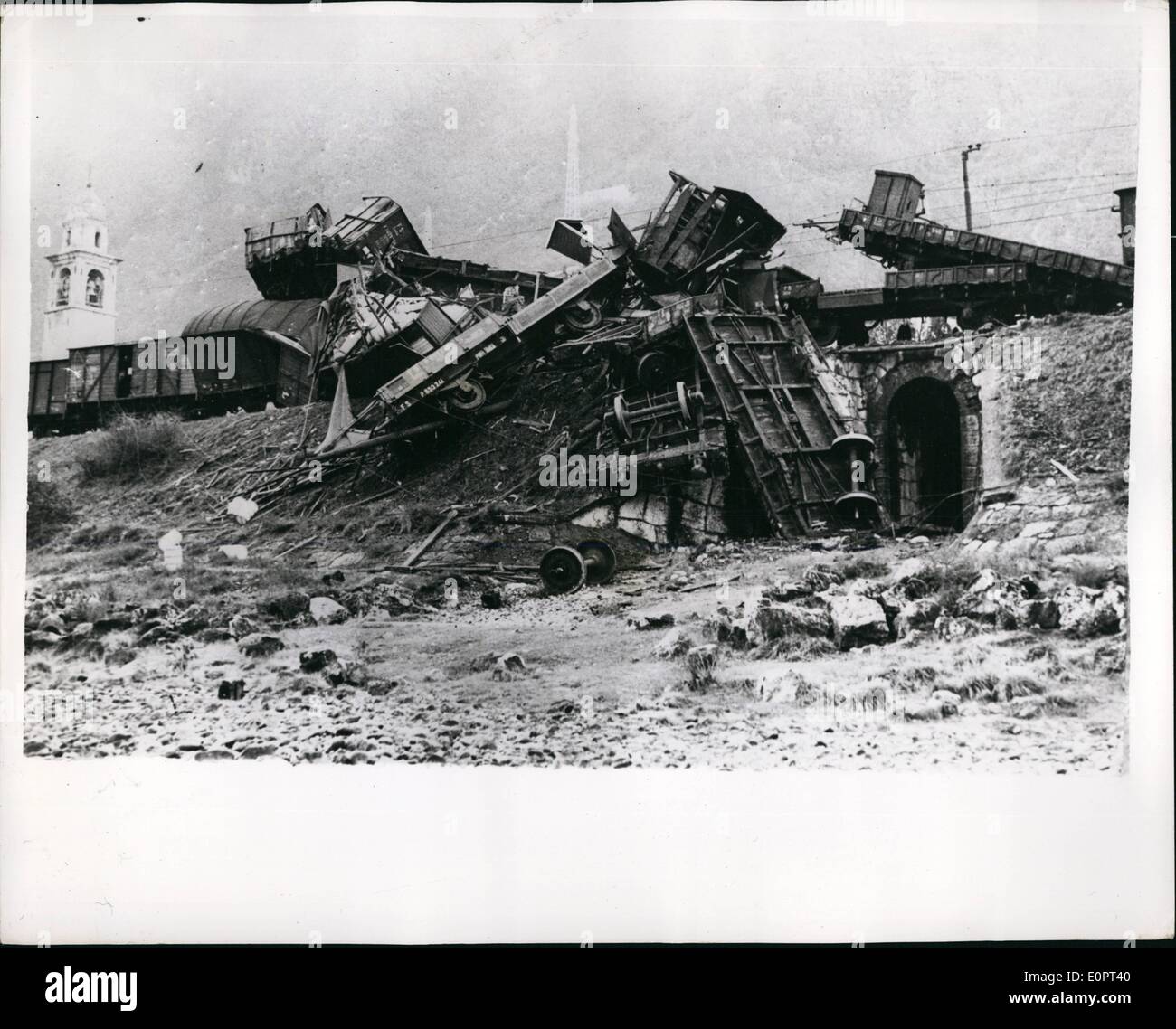 Feb. 02, 1957 - Goods Train Disaster near the Brenner Pass. More than forty seven wagon a were destroyed when a forty seven wagon goods train was derailed at Rovereto, near Trent, in Northern Italy recently. The disaster was caused by the axle of one of the wagons broke loo Damage is ed mated at many million lire - but luckily no lives were lost. Photo Shows The scene of the disaster - showing some of the wrdoked trucks. Stock Photo