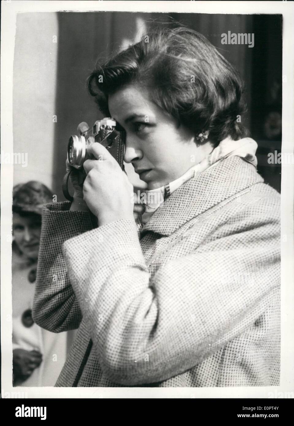 Feb. 02, 1957 - New American Ambassador Presents Oredentials. Mr. John Hay Whitney, the new American Ambassador to Britain, went to Buckingham Palace today to present his ordentials. Photo shows Photographing the scene at the Embassy today, is Kate - Mrs. Whitney's daughter by her former marriage to Mr. James Roosevelt. Stock Photo