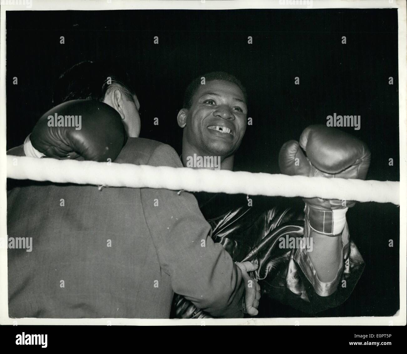 Feb. 02, 1957 - Nino Valdes knocks out Joe Erskine in first round. the hobby victor. Cuba's Nino Valdes beat Joe erdkine of Cardiff by a N.O. In the first round of their 10 round contest at earl's court last night. photo shows Nino Valdes with the smile of victory on his - after his sensational defeat of Joe erakine last night. Stock Photo