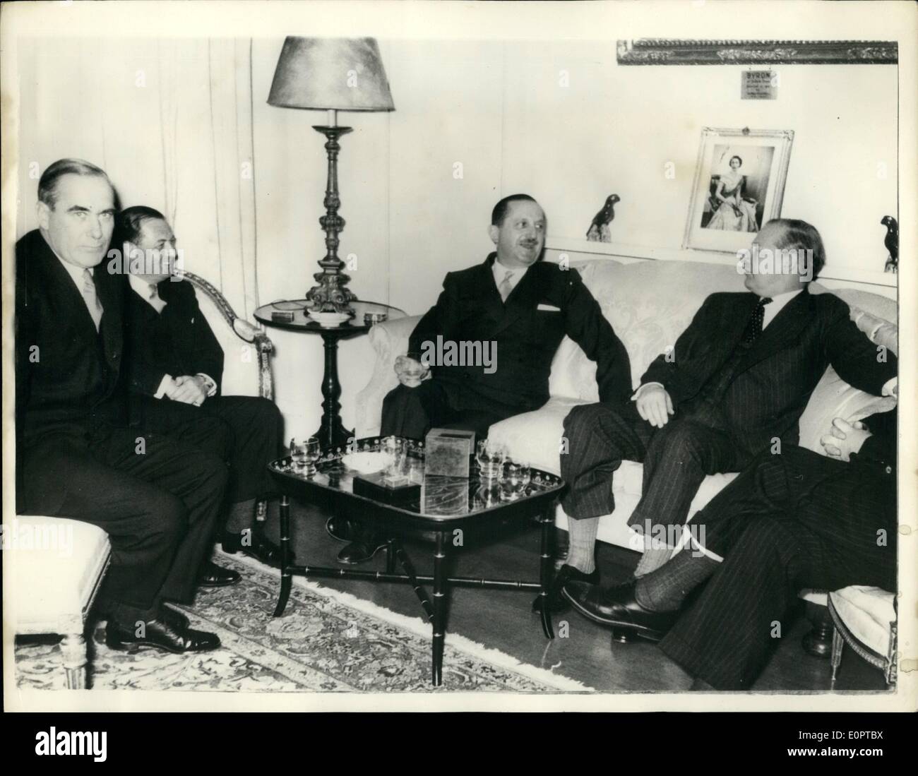 Feb. 02, 1957 - Mr. Selwyn Lloyd meets Greek Government Ministers.. Mr. Selwyn Lloyd the British Foreign Minister out forward Britain's proposals for a settlement of the Cyprus problem when talks between Britain and Greece opened in Athens. Mr. Lloyd paid a courtesy visit on the Greek Prime Minister - and Mr. Averoff the Greek Foreign Minister called at the British Embassy.. Keystone Photo Shows:- Scene during the meeting of the Ministers at the British Embassy in Athens Stock Photo