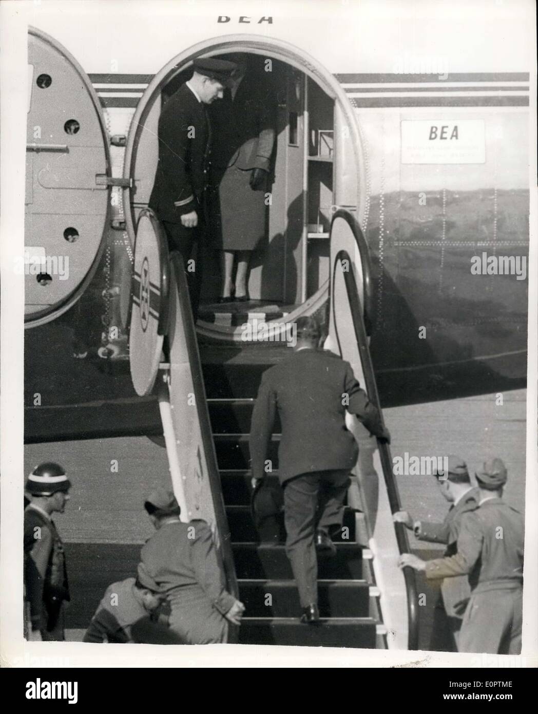 Feb. 18, 1957 - Queen and Duke Reunited: H.M. The Queen and The Duke of Edinburgh who have been parted for four months while the Duke has been on his Commonwealth tour - were reunited on Saturday at Montijo airfield, near Lisbon on Saturday. Their state visit to Portugal starts today (Monday). Photo shows The Duke of Edinburgh enters the aircraft - two steps at a time on the Queen's arrival at Montijo airfield. Stock Photo