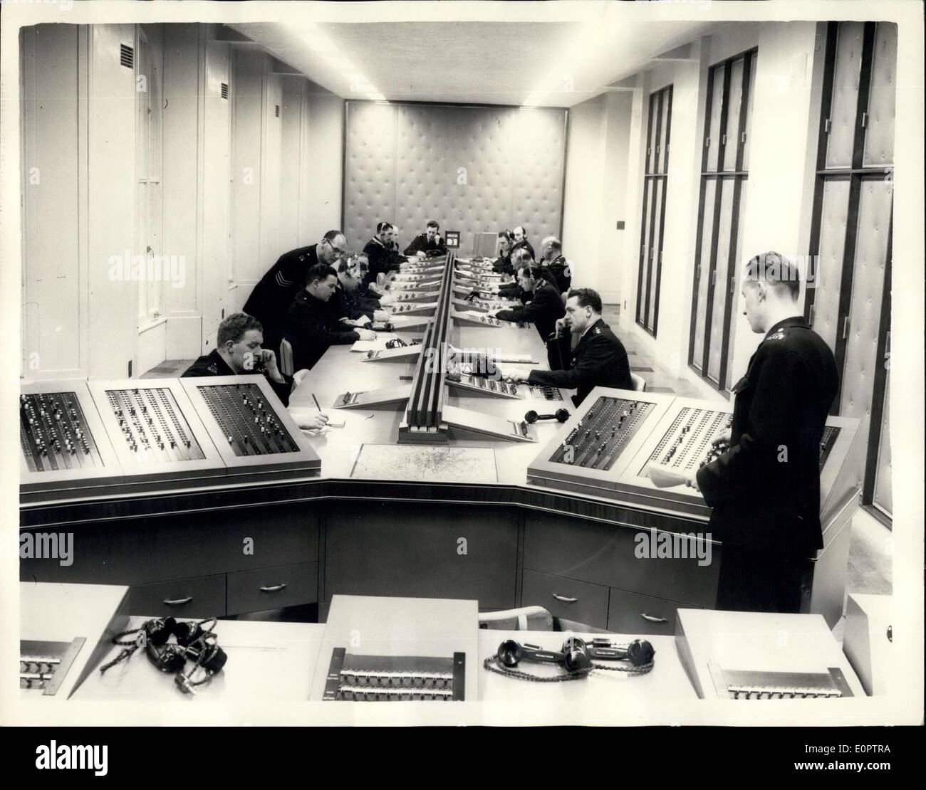 Dec. 28, 1956 - Scotland Yard's New Information Room: Scotland Yard's new Information Room has been designed to met the great increase in 999 calls and to accommodate the new mechanically and electrically aided system of working no to be employed. It deals with incident's in the whole of the Metropolitan and city police districts - an ware of 736 square miles and a population of 8 1/2 million, The Information Room is a clearing centre where information about matters requiring police attention is received and distributed Stock Photo