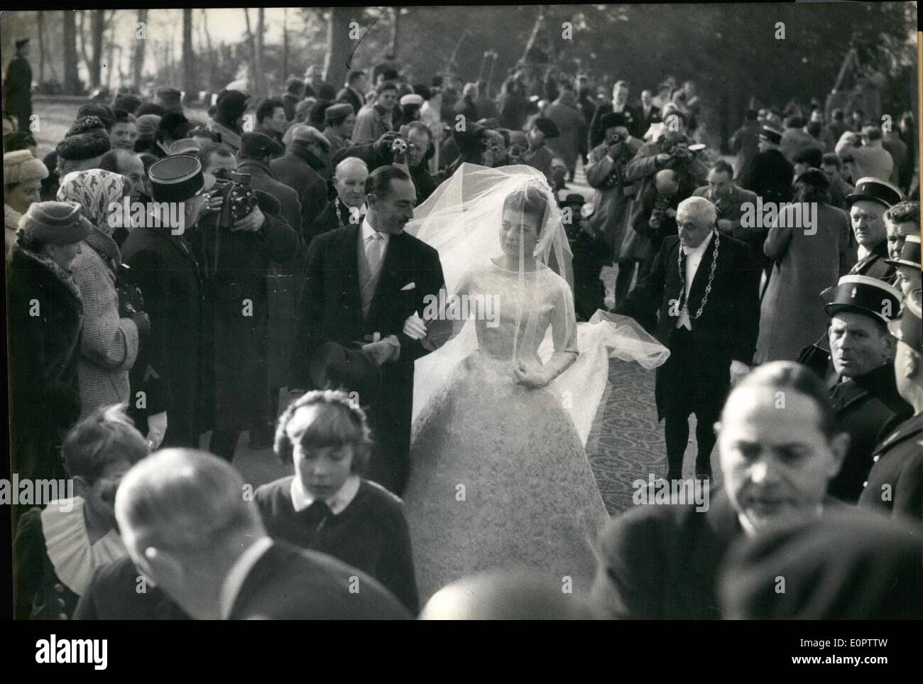 Jan. 01, 1957 - Wedding of Princess Helene of France. Religious Ceremony on Royal Chapel: The Bride, escorted by her father, the Count of Paris, arriving at the Royal Chapel for the Religious Ceremony this morning. Stock Photo