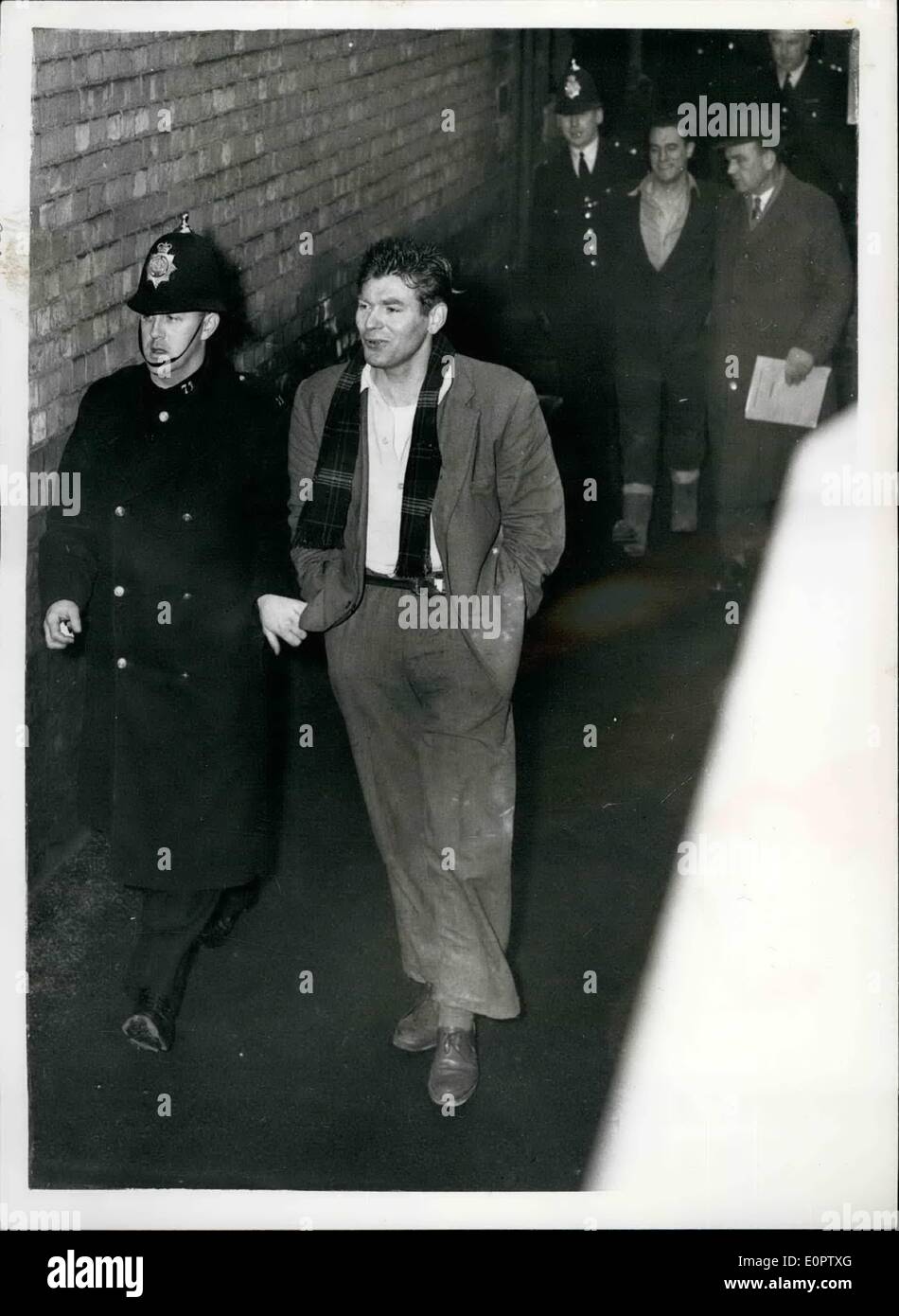 Jan. 01, 1957 - Runaway Mental Patients Captured after Sixty Five Hours of Freedom... The two mental patients who escaped on Friday from Rampton Institute, Notts., were captured yesterday after sixty five hours of freedom. The two men 27 year old Frank Ellis and 19 year old Richard Maskill broke into the home of 44 year old Mrs. Marjorie Wagner at Weston on Trent... They made Mrs. Wagner supply them with a meal - she managed to raise the alarm - the two men made getaway but they were caught and overpowered at a garage just North of Newark.. Stock Photo