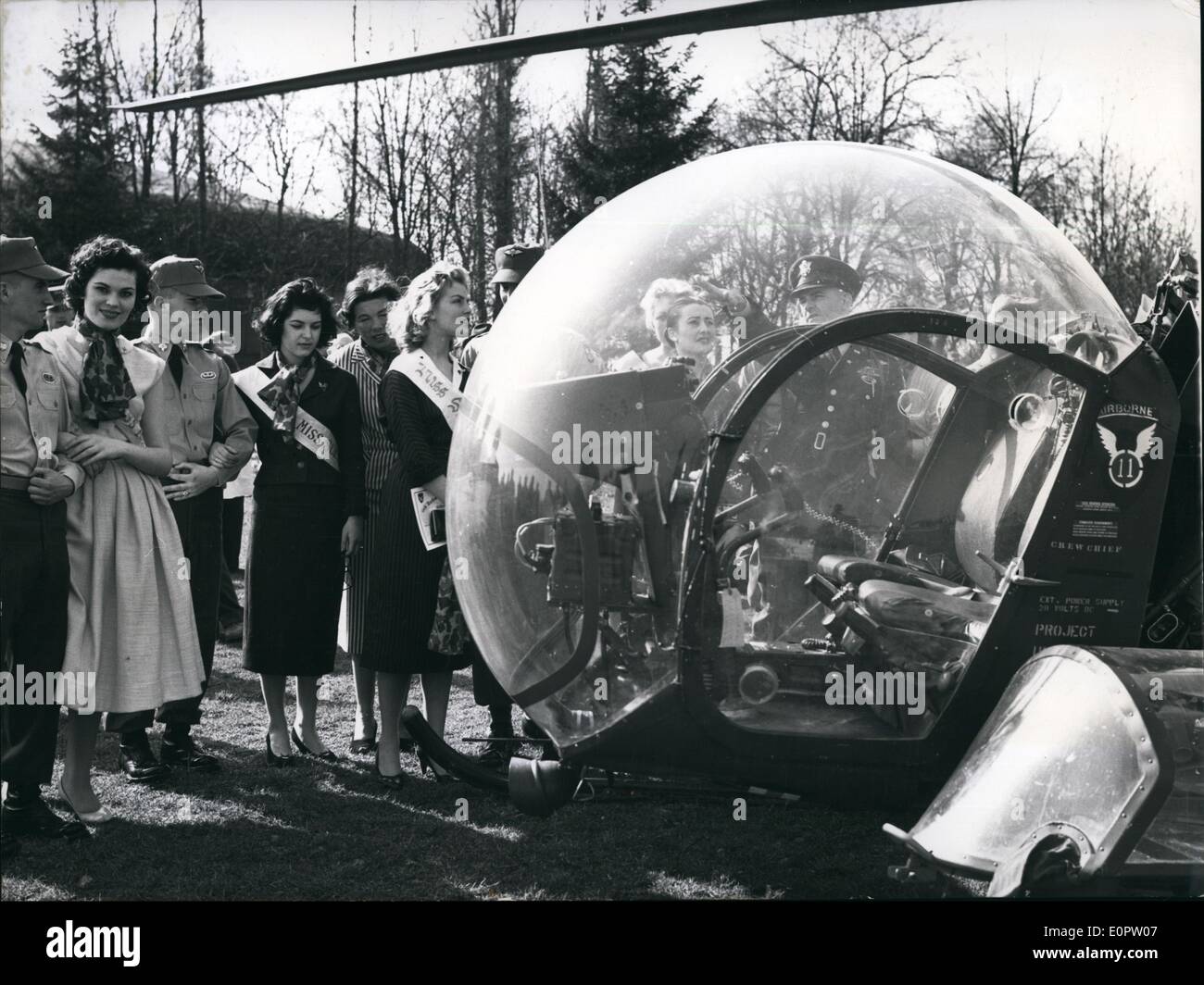 Mar. 03, 1957 - A pleasures for GI's: was the visit of beauty queens of Sweden, Finland, Dutch, France, Greece, Austria, Swiss and Germany to the Engels division of the American Armee at Augsburg/Germany. Each queen became a member of honour to the division. Photo Shows The beauty queens looking at a helicopter. from left to right Miss Greece, Switzerland and Sweden. Stock Photo