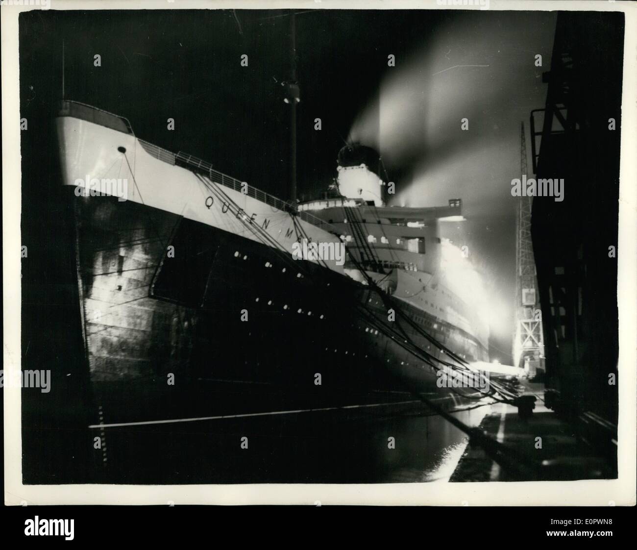 Mar. 03, 1957 - The S.S. Queen Mary Leaves Southampton For The U.S. In Spite Of Strike Ban. Photo Shows: The S.S. Queen Mary seen when about to leave Southampton in the early hors of yesterday.. She left in spite of the ban placedon her by the shipbuilding strikers.. They claim she was ''black'' as repairs had not been completed when she left the repair yards on Saturday - and therefor should remain in Dock. Stock Photo
