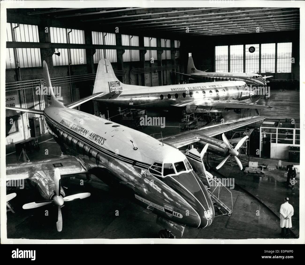 Mar. 03, 1957 - New Bolts For Viscounts: A Viscount airliner will be used as a ''guinea pig'' to investigate the bolt fatigue which brought about the Manchester Airport crash last week. Vickers are determined to make absolutely sure that their world-beating plane will be 100 percent safe in future. The first step has been to replace every wing flap bolt in every Viscount which could possibly be in danger. Photo shows A Viscount aircraft having new bolts fitted, after the Ringway crash last week. Stock Photo