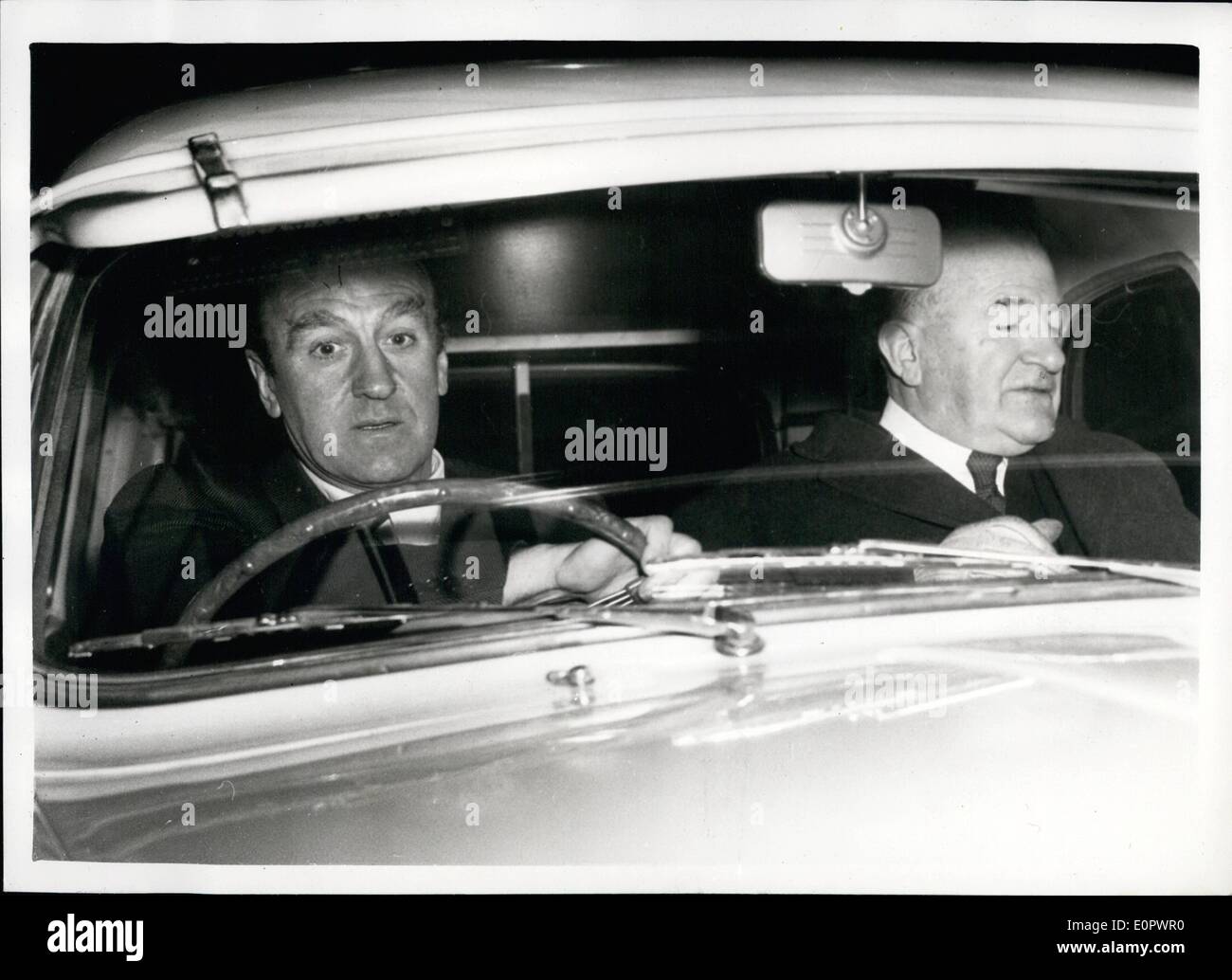 Jan. 01, 1957 - New Minister of Power Arrives In London. Sir Percy Mills, the new Minister of Power, whose home is at Studley, Warwickshire, arrived in London from Birmingham, to take up his new duties. He was met at Paddington by Mr. Ernest Marples, MP. Keystone Photo Shows:- Mr. Ernest Marples, who met Sir Percy Mills, at Paddington seen driving him from the station. Stock Photo