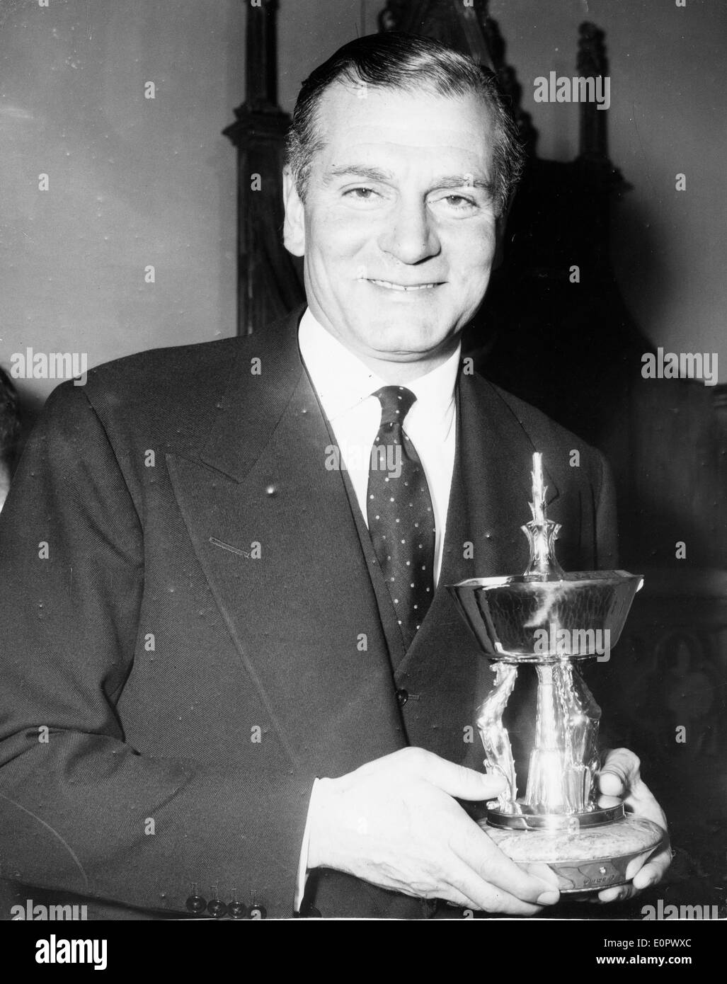 Actor Laurence Olivier with Silver Pears Trophy Stock Photo