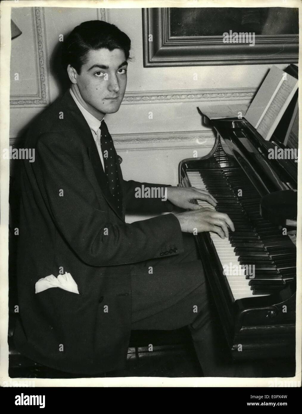 Apr. 04, 1957 - Lord Londonderry's Ambition is to Become a Concert Pianist The Marquess of Londonderry, who practices four hours a day on the piano, seen at home yesterday. His ambition is to become a concert pianist. Stock Photo