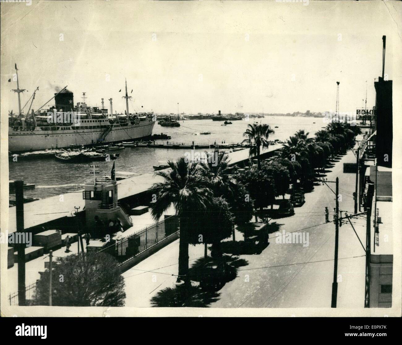 Apr. 04, 1957 - The Suez Canal is clear at Lt. Nine ships pass Through : The Suez Canal is now clear and  opened to ships of 30ft. draft - i.e. up to about 20,000 tons. A convoy of nine ships belonging to five different shipping compa passed in advance in accordance with the Suez Canal Authority regulations. Photo shows One of the nine ships passing through the Suez Canal. Stock Photo