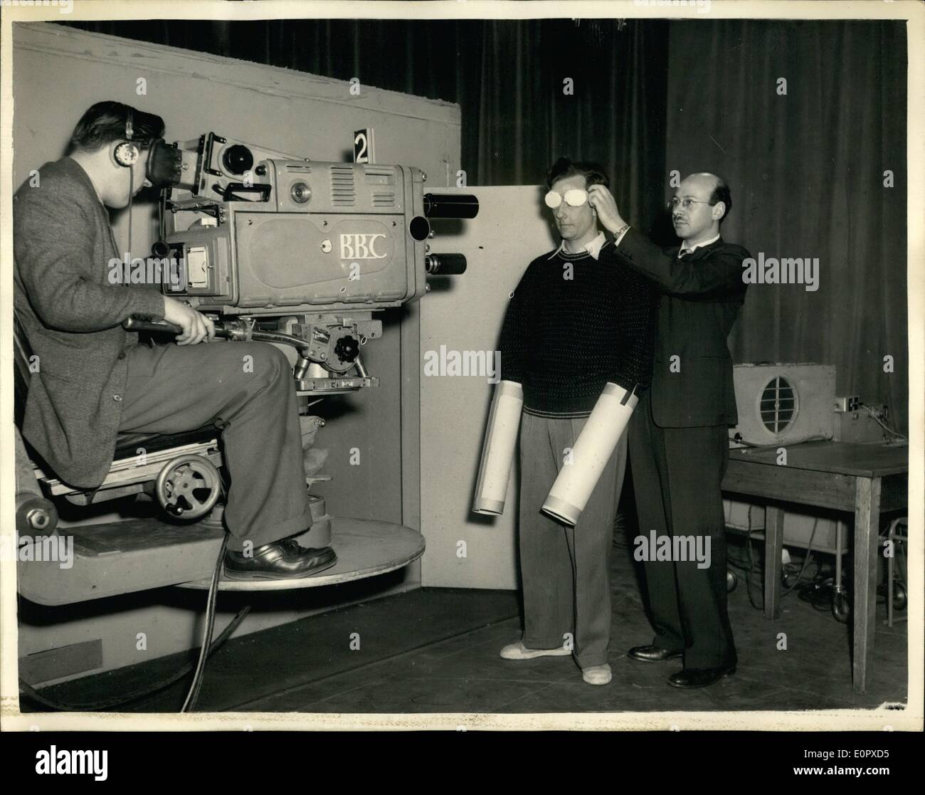 Apr. 04, 1957 - Birmingham Psychologist undergo Brainwashing experiment in a TV show: This evening viewers on B.B.C television will see Mr. Russell Willett, of Maudsley, Birmingham, take part in a brainwashing experiment in the Lime Grove show ''Tonight''. He will be placed in a sound proof box in the studio and. provided he can last the course, will emerge 24 hours later. the idea is to illustrate how a brainwashing can work how a man completely insulated from the world may change his ideas in a short time Stock Photo