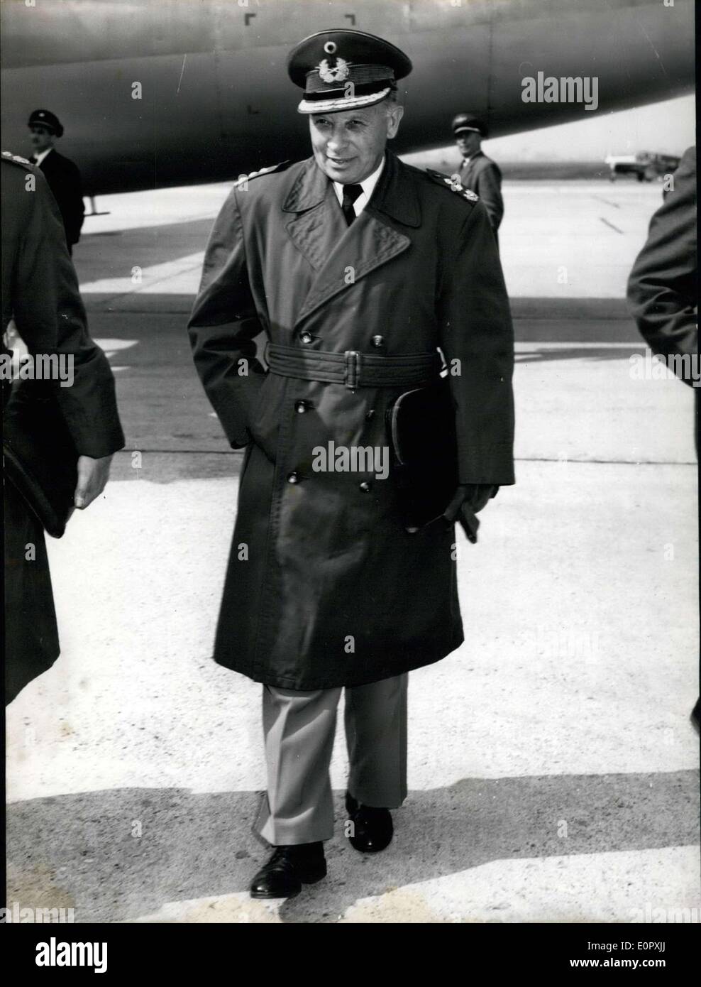 Apr. 09, 1957 - New Armsplanes in the bag??? From a visit in the USA, the German General Adolf Heusinger came back to Germany today. OPS: General Heusinger leaving the airport in Dusseldorf-Lohausen. Stock Photo