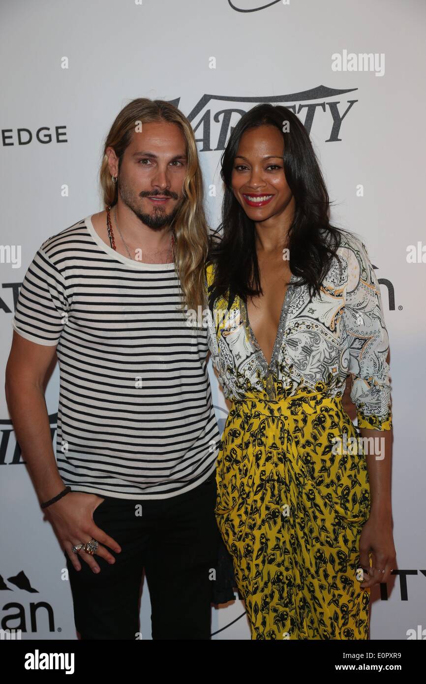 Actress Zoe Saldana and husband Marco Perego attend the Relativity 10th anniversary lunch during the 67th Cannes International Film Festival at Hotel Du Cap in Cap d'Antibes, France, on 18 May 2014. Photo: Hubert Boesl NO WIRE SERVICE Stock Photo
