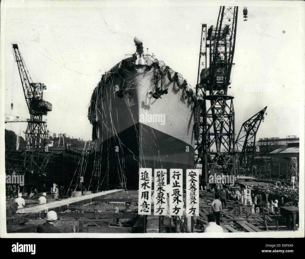 Jun. 06, 1957 - NewJapanese tanker enters the water.. 21,100 vessel launched at Yokosuka. The 21,100 ton Japanese built tanker ''Fujikawa Maru'' enters the water at the Uraga Dookyard, Yokosuka former base of the Imperial Japanese navy during her recent launching .. The ceremony was carrie out by a schoolgirl Akiko Makazana daughter of Rokuro Nakazawa, managing director of the Kawasaki Steamship company for whom the tanker was built. Stock Photo