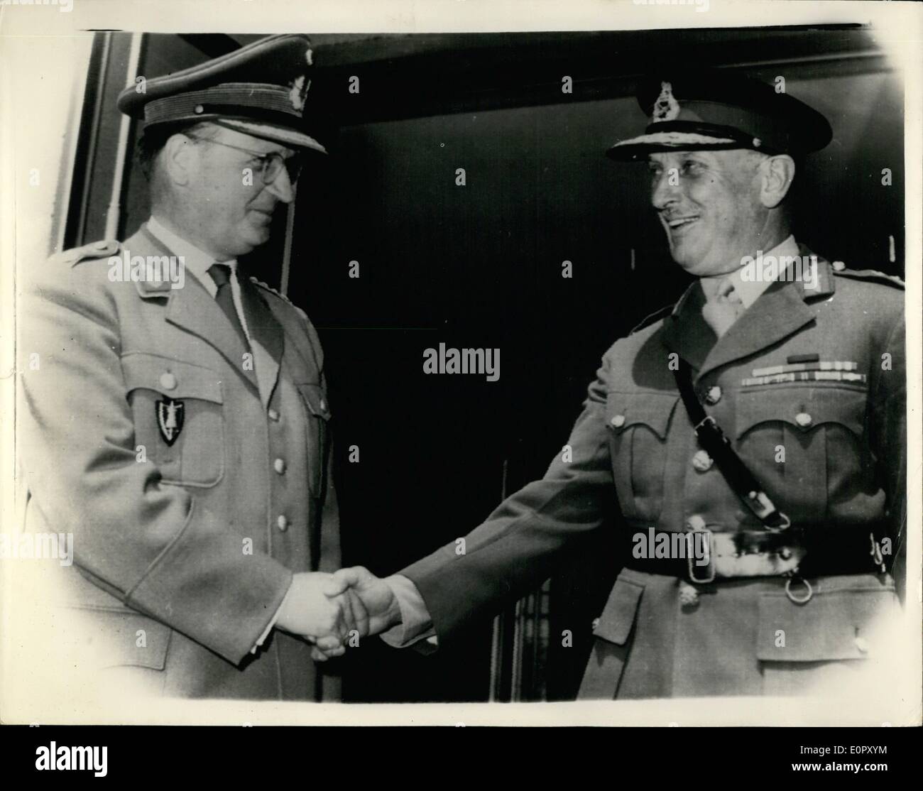 Jun. 18, 1957 - 18.6.57 General Speidel visits NATO H.Q. in Germany. Hans Speidel, the German Commander of Allied Land Forces, Central Europe. who has just been promoted from Lieut-General to General, today paid his first official visit to NATO headquarters at Munchen-Gladbach, which is under the command of General Sir Dudley Ward, C-in-C British Rhine Army. Keystone Photo Shows: General Speidel (left) shakes hands with General Sir Dudley Ward, at Munchen-Gladbach today. Stock Photo