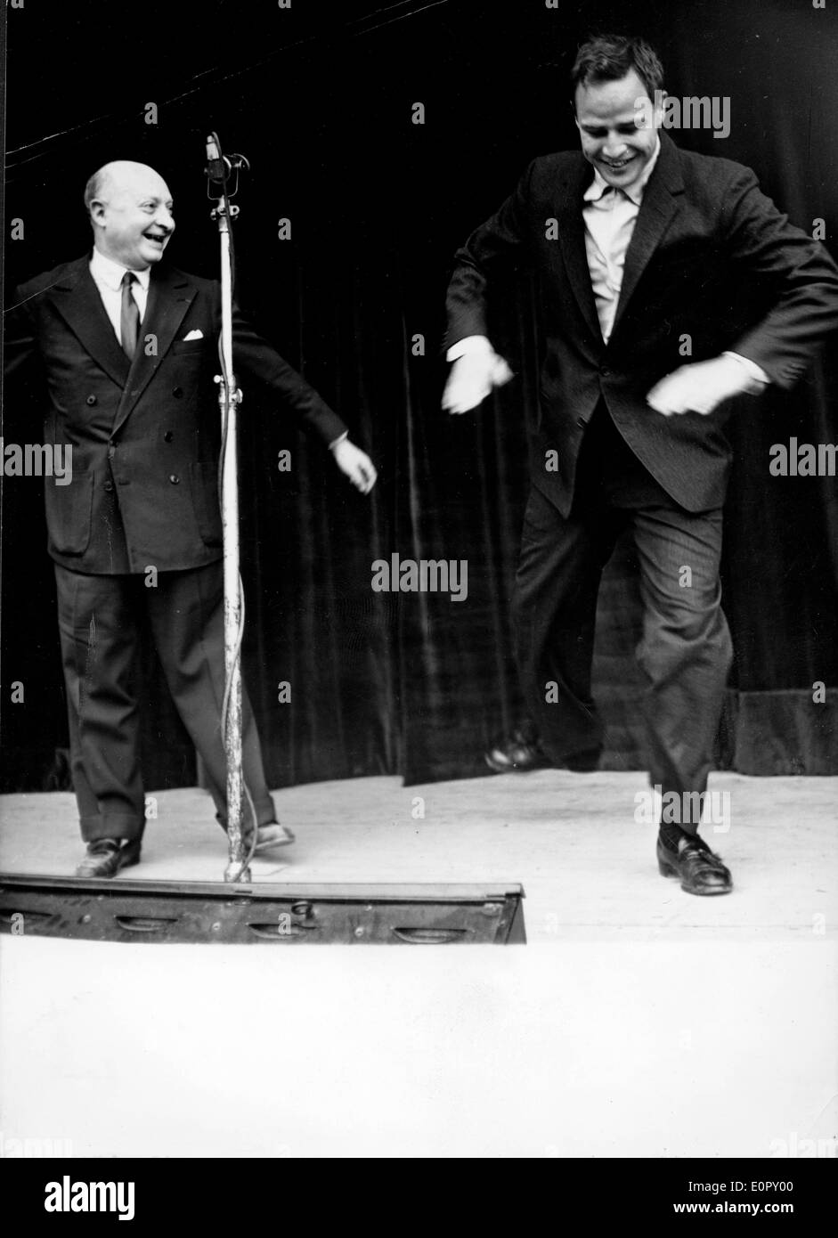 Actor Marlon Brando dancing on stage with Roger Feral Stock Photo