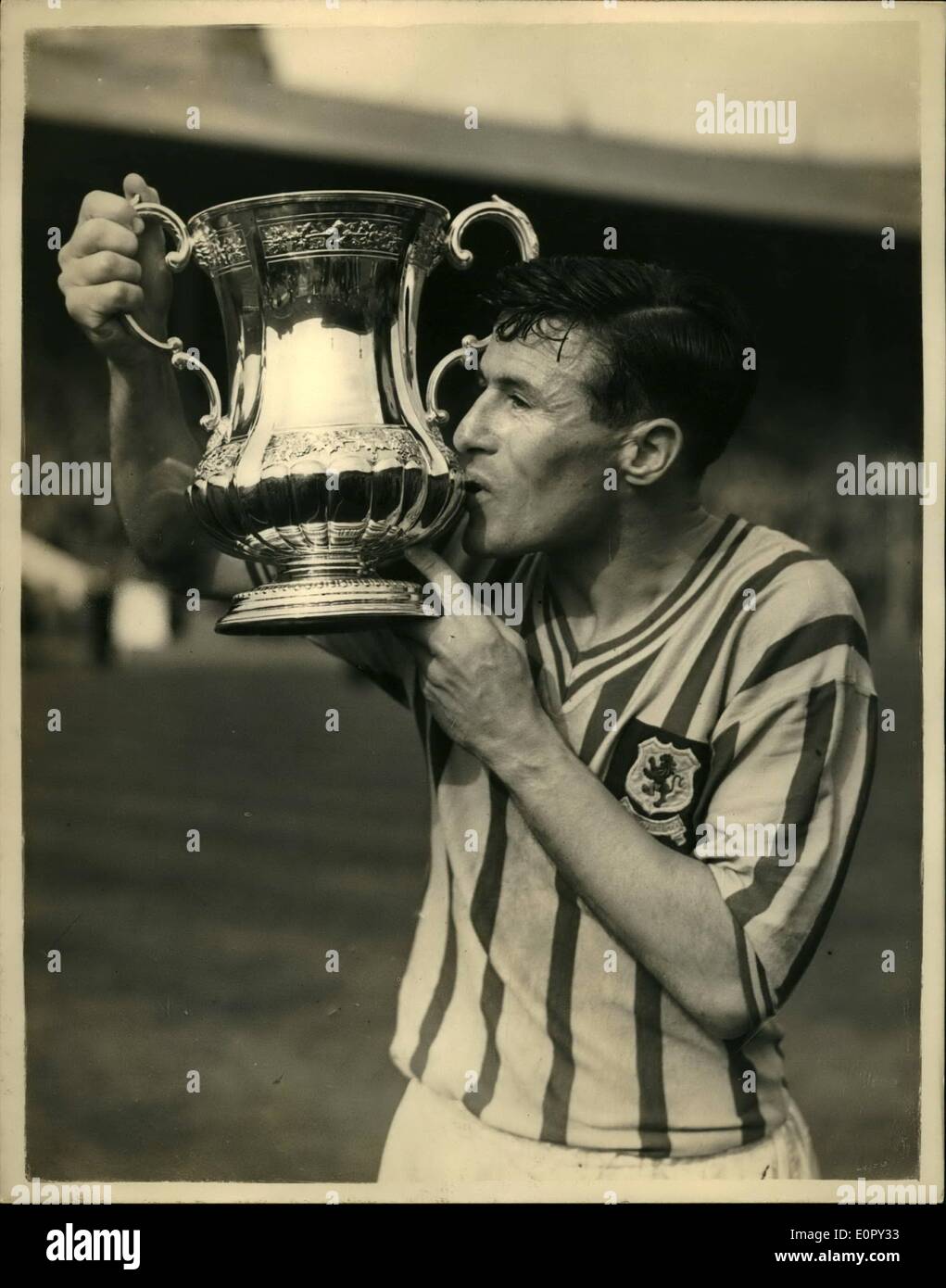 May 04, 1957 - 4-5-57 Aston Villa win the F.A. Cup at Wembley. A kiss for the cup Ã¢â‚¬â€œ Aston Villa won the 1957 F.A. Cup at Stock Photo