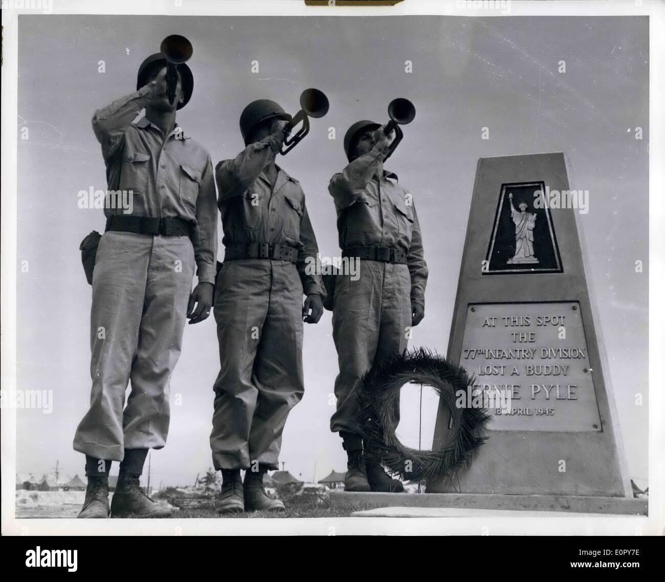 May 05, 1957 - America Honors Its War Dead: Ernie Pile, The Popular War Correspondent Of World War II, Lost His Life Covering The Invasion Of IE Shima In The Pacific. Men Of The Army's 77th Infantry Division Have Marked The Spot Where He Was Killed With A Memorial. Official U.S. Army Photo Released By The Dept. Of Defense Re-Released Wash., D.C. Stock Photo