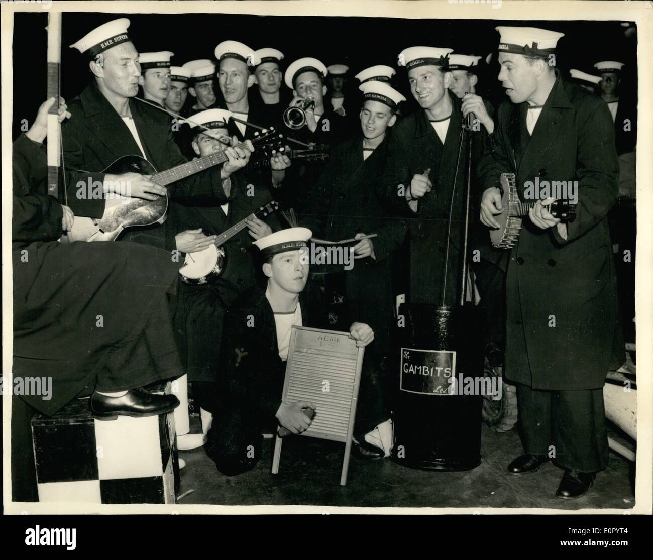 May 05, 1957 - Queen's visit to the home fleet. Preparations for concept party.: Photo shows the ''Gambits'' from H.M.S. Gambia, ''The Skowballs'' from H.M.S. superb, and the ''Oceanaires'' from H.M.S. ocean three skiffle groups, seen rehearsing aboard H.M.S. Albion for the concert party to be given for the Queen tonight (Yuesday) by officers and Naval ratings of thr fleet. Stock Photo
