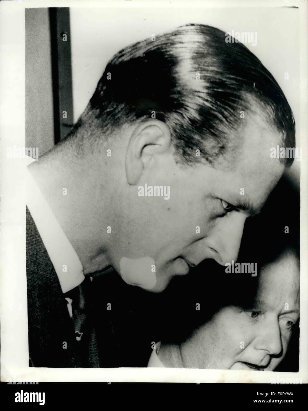 May 10, 1957 - Prince Philip presents ''Designs of the Year'' Award, wears plaster on chin.. - At a ceremony at the Design Centre, Regent Street - this afternoon, H.R.H. Prince Philip presented awards to the manufacturers of the 12 products selected for their outstanding design from some 3,500 articles showing at the centre during its first year. The products selected for the awards cover a wide range and include a TV receiver, a convector open fire, a carpet, wallpaper, china, oven glass - table galss cutlery and a settee-bed Stock Photo